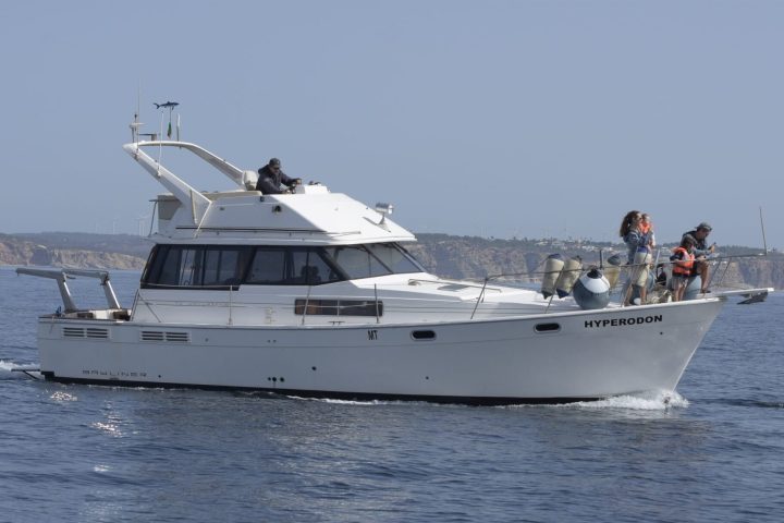 a small boat in a large body of water