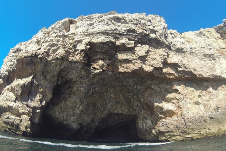 a rock formation near a body of water