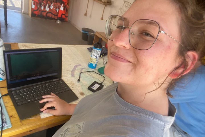 a person using a laptop computer